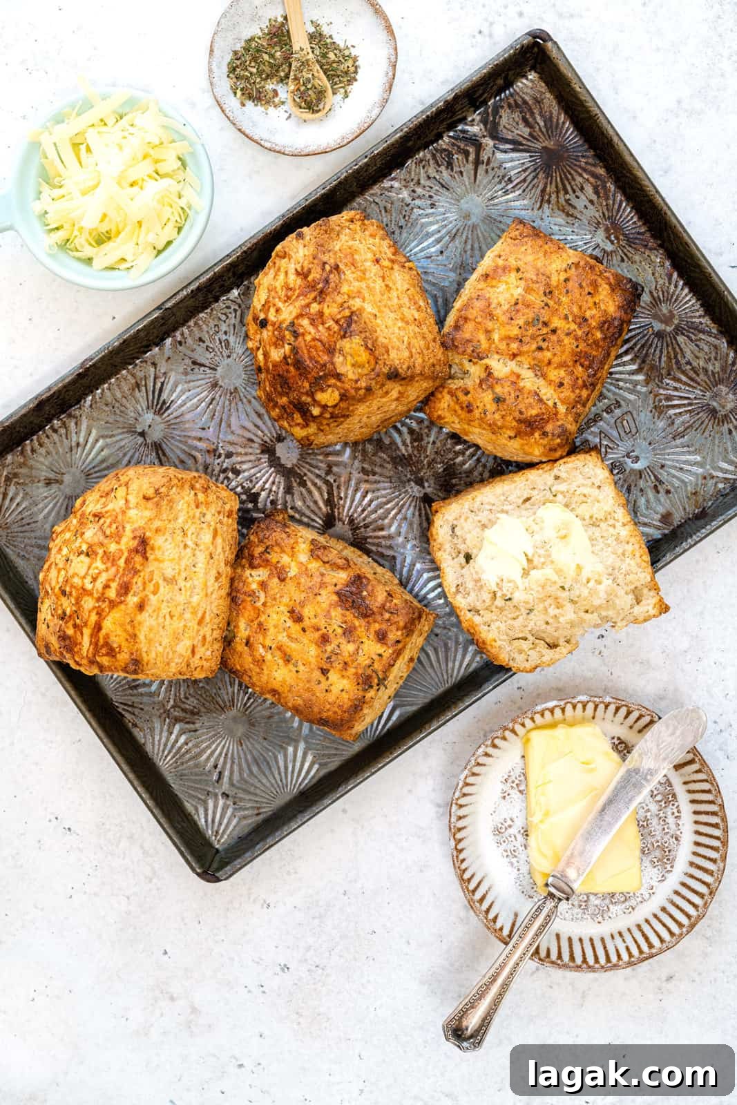 split open sourdough cheese scone with butter