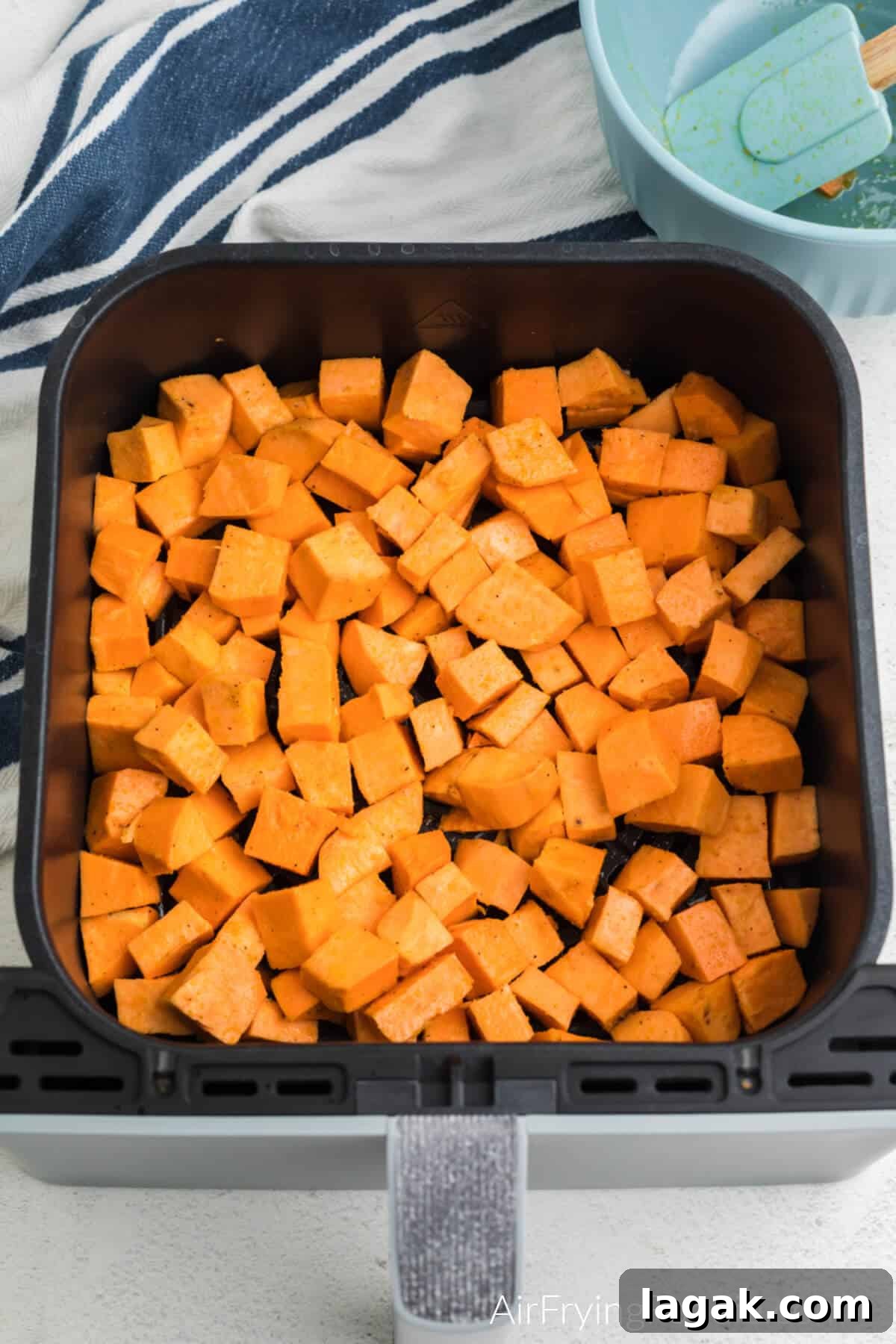 Crispy Air Fryer Sweet Potato Cubes Recipe 8 Step 4 arrange in air fryer