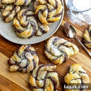 Pastries with Nutella swirled in them on a plate.