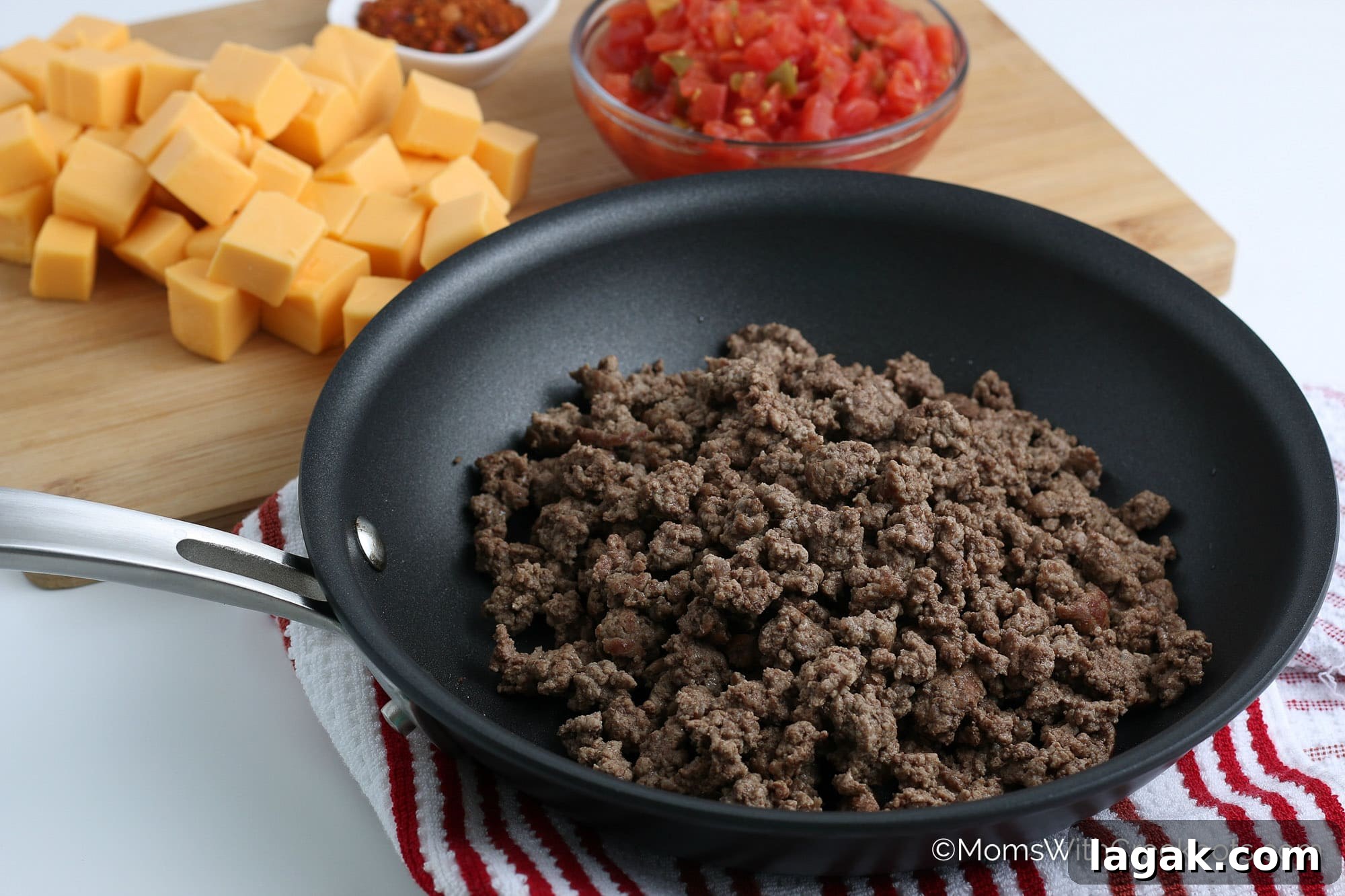 4-Ingredient Crockpot Rotel Dip Recipe for Game Day 4 Ground beef browned in skillet