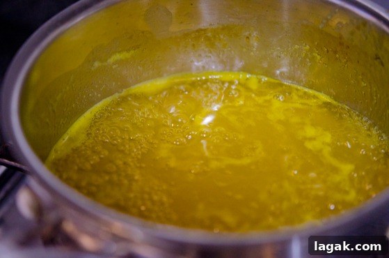 tutorial_-13 Fresh orange and lemon saucd is simmered to thicken slightly.