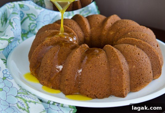 tutorial_-14 Lucious orange sauce is poured over orange cake.