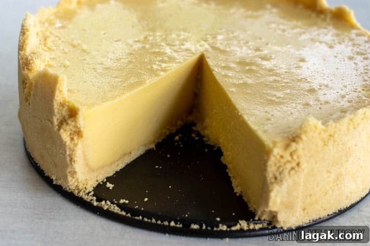 no bake passion fruit cheesecake with one piece missing
