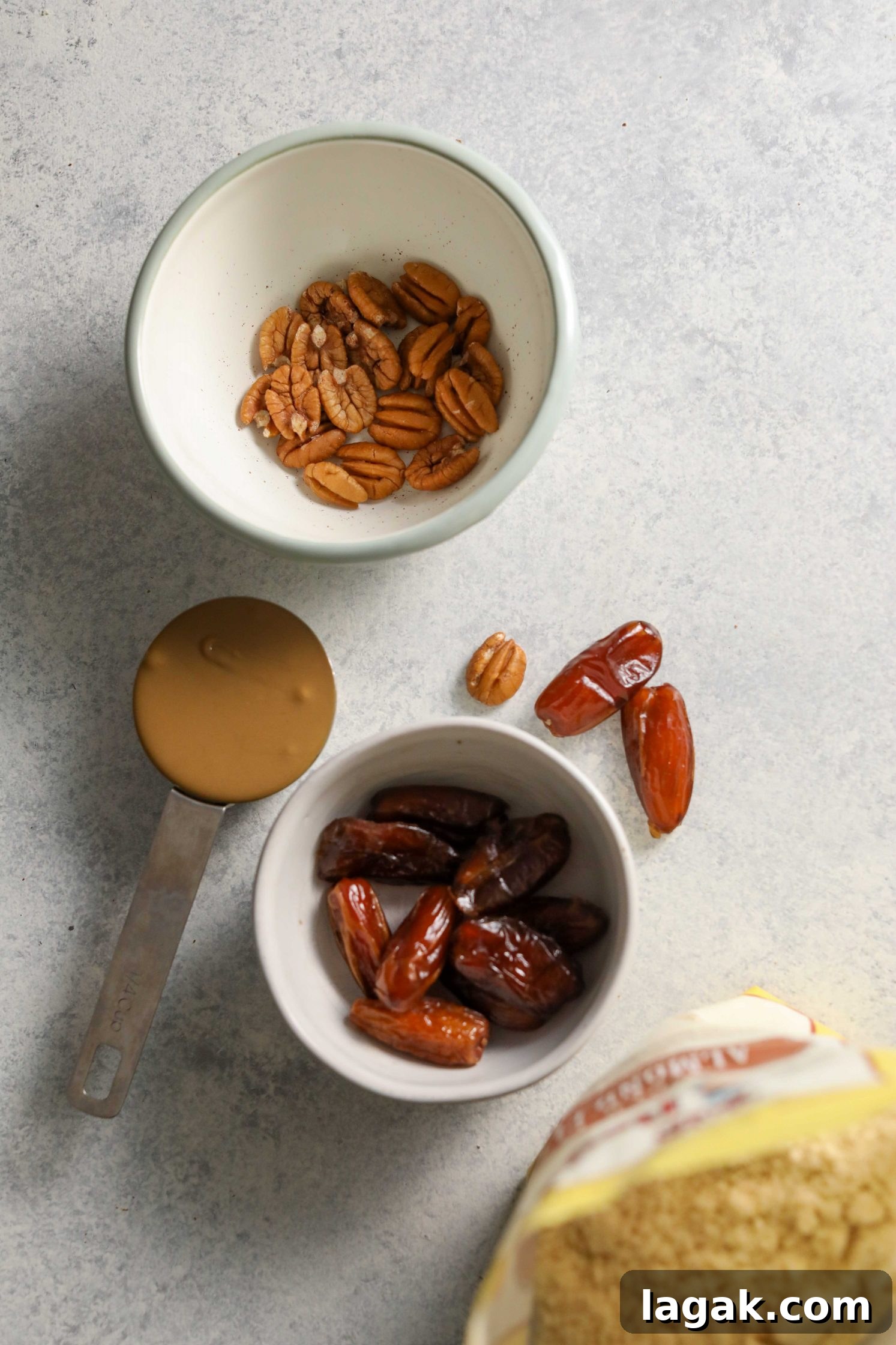 Chewy Pecan Pie Bars with Buttery Shortbread Crust 3 pecans and dates and almond flour and SunButter by Flora & Vino