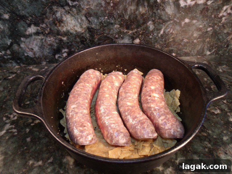 Spicy Bratwurst Chili Casserole Recipe for Crowd Meals 3 Lay Sausages on Top of Chips