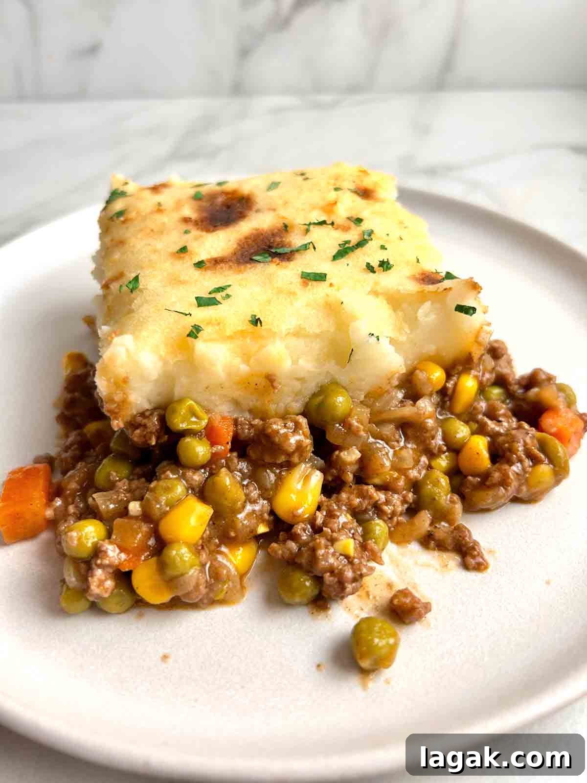 slice of shepherd's pie on plate.