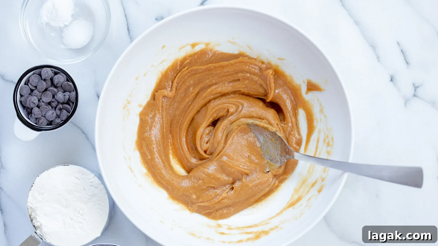 Wet ingredients mixed in a white bowl