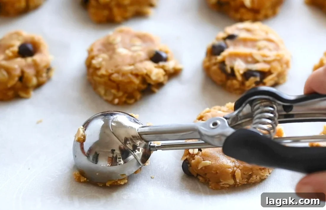 Cookie dough on a parchment lined baking sheet