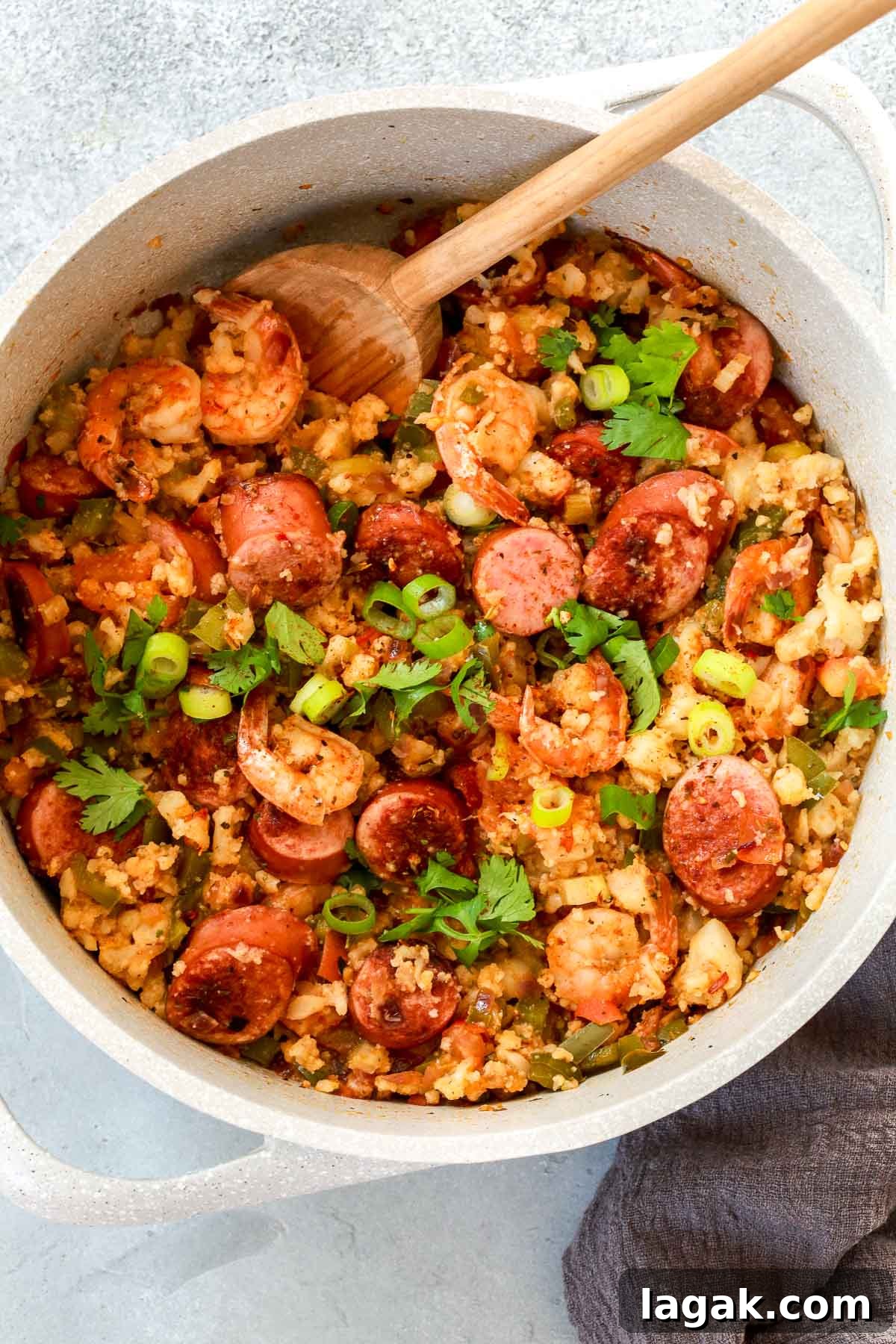 Having a Whole30 jambalaya recipe in your recipe box means never missing out on these amazing traditional Louisiana flavors. Make a few small changes and enjoy this southern comfort food while maintaining your diet. bowl of Whole30 jambalaya