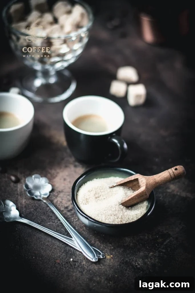 Brown Sugar in Coffee: Flavor Tips, Brewing Methods & Sweetening Guide 2 Brown sugar in dark green bowl next to black cup filled with black coffee.