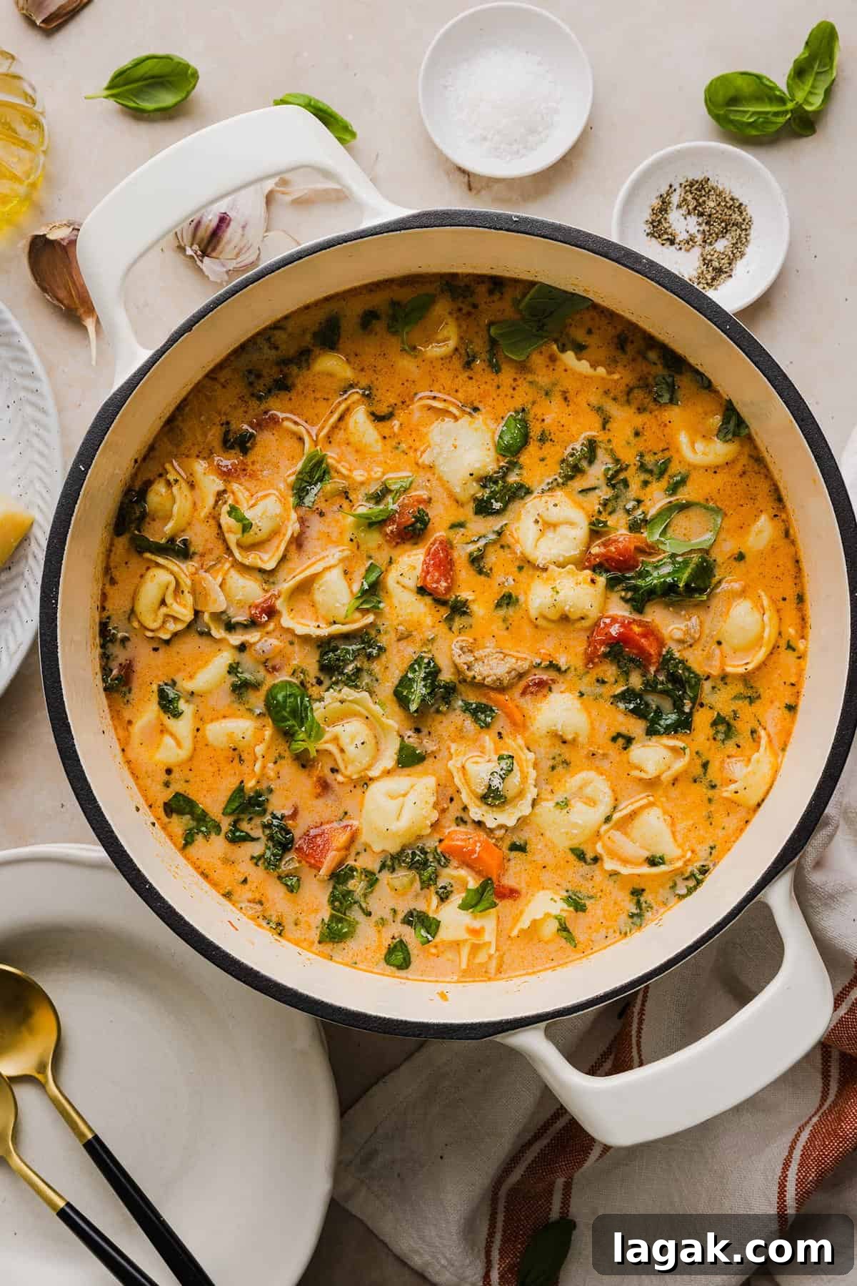 This Creamy Tortellini Soup is cozy, comforting and made with tender cheese tortellini, fresh veggies, herbs and a rich creamy broth. The perfect one pot meal that is both flavorful and satisfying!