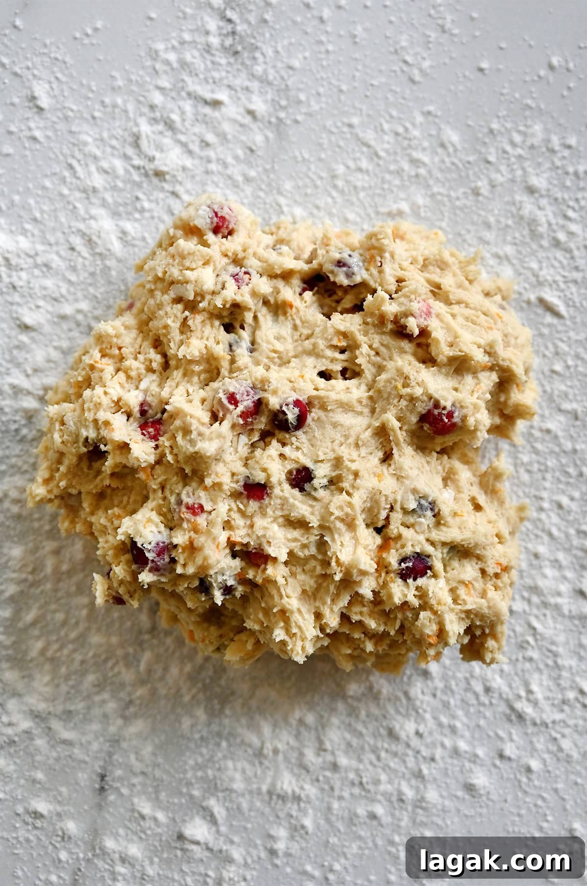 Cranberry Orange Scones with Sweet Citrus Glaze 8 Shaping orange cranberry scone dough on a floured surface.