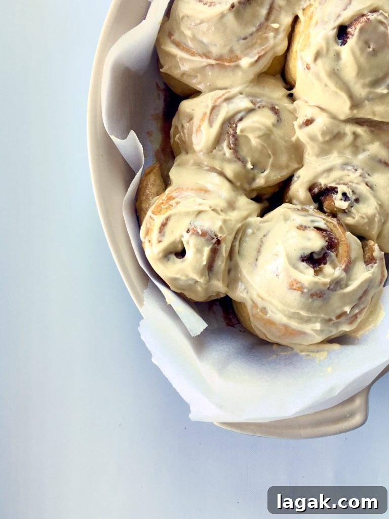 Carrot Cake Cinnamon Rolls with Maple-Tahini Cream Cheese Icing 5 Carrot cake cinnamon rolls, maple-tahni cream cheese icing.