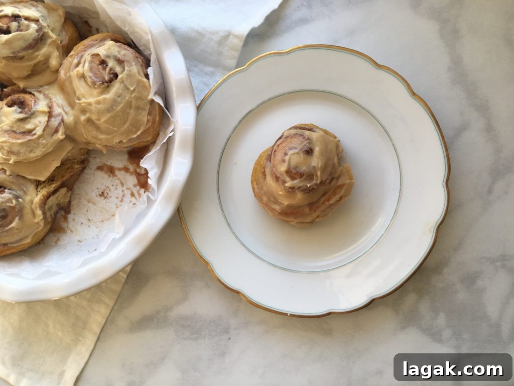 Carrot Cake Cinnamon Rolls with Maple-Tahini Cream Cheese Icing 6 carrot cake cinnamon rolls, maple-tahni cream cheese icing.