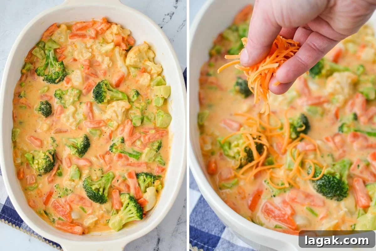 Sprinkling cheese on top of a vegetable casserole.