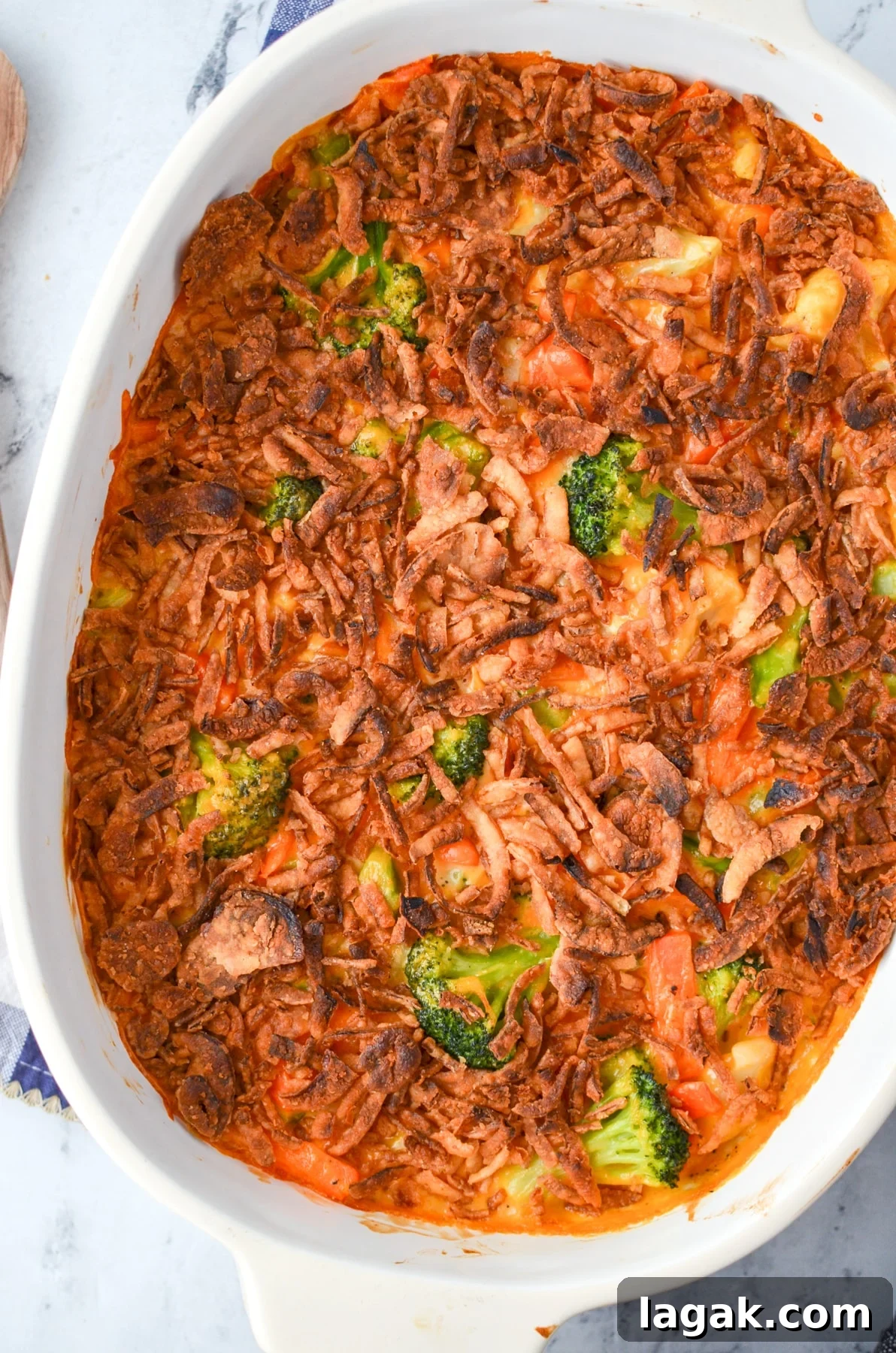 A vegetable casserole topped with crispy onions.