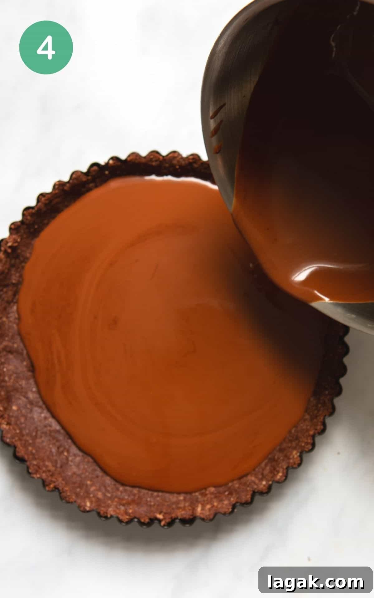 Decadent Vegan Chocolate Tart Recipe for Rich, Creamy Desserts 7 Step 4: Finally pour your chocolate mix into the tart tin and place in the fridge for 2-3 hours until it firmed up.