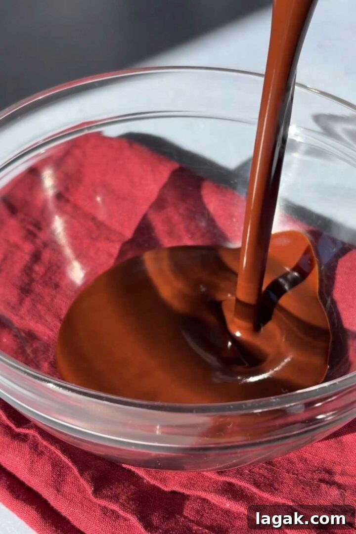 Instant Chocolate Mousse with One Ingredient — Quick Recipe 7 Pour smooth chocolate and water mixture into a clean bowl.