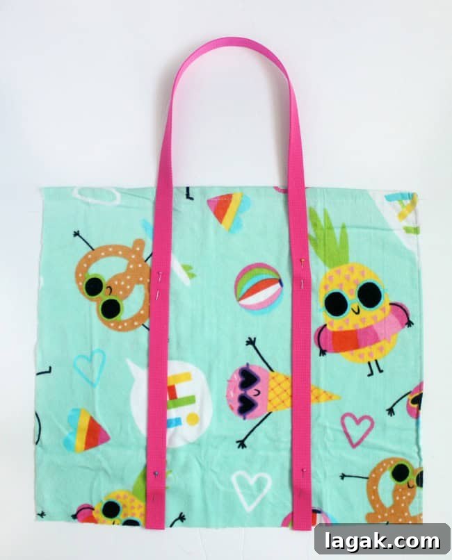 Turn a Beach Towel Into a Stylish DIY Beach Bag in Minutes 7 Finished beach bag filled with towels