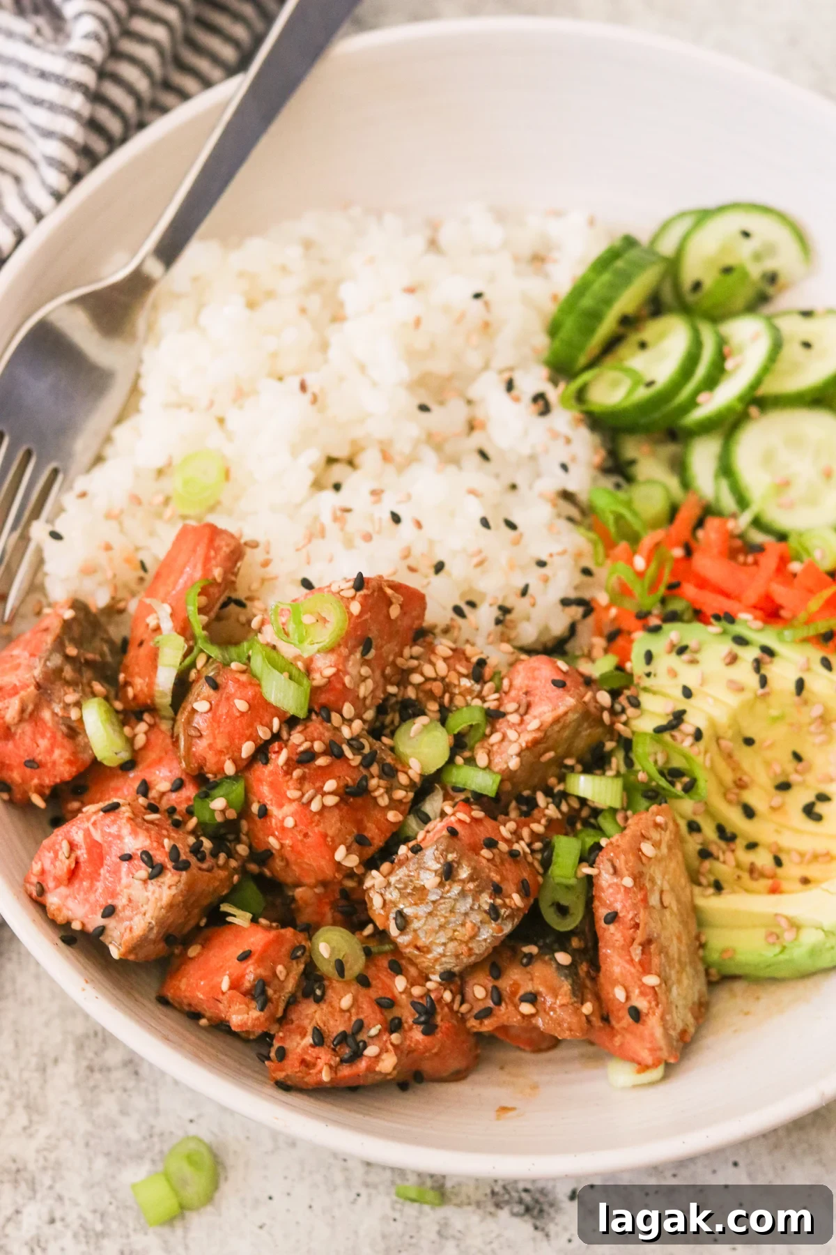 Crispy Air Fryer Teriyaki Salmon Recipe in 20 Minutes 6 an up close shot of teriyaki salmon topped with sesame seeds