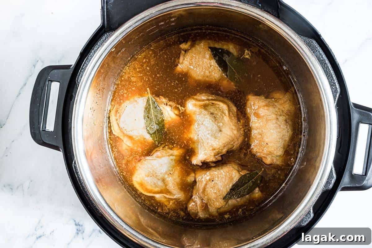 Instant Pot Filipino Chicken Adobo Recipe — Quick Authentic Flavor 4 cooked chicken adobo in the Instant Pot.