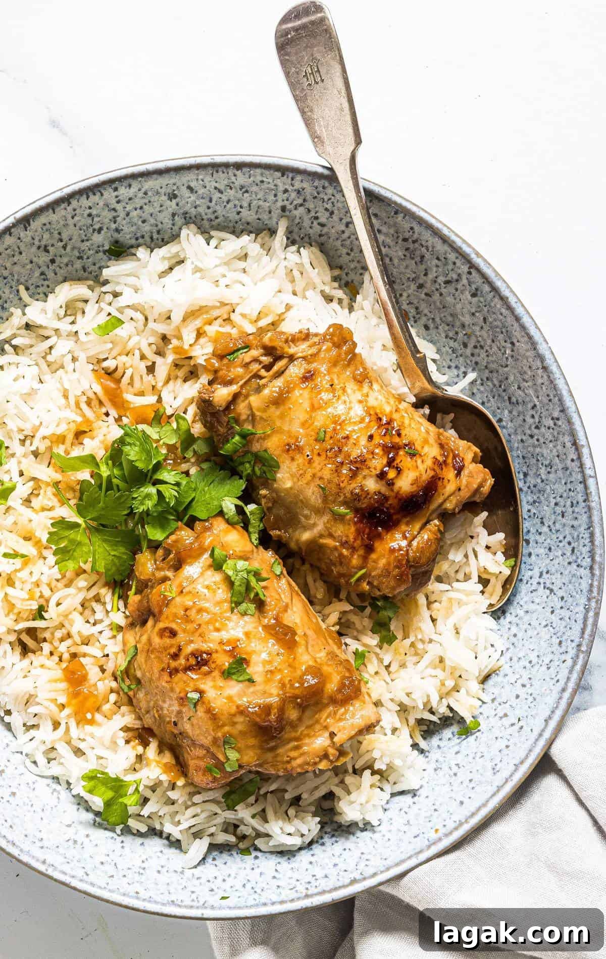 Instant Pot Filipino Chicken Adobo Recipe — Quick Authentic Flavor 6 pressure cooker adobong manok on a bed of steamed rice in serving bowl