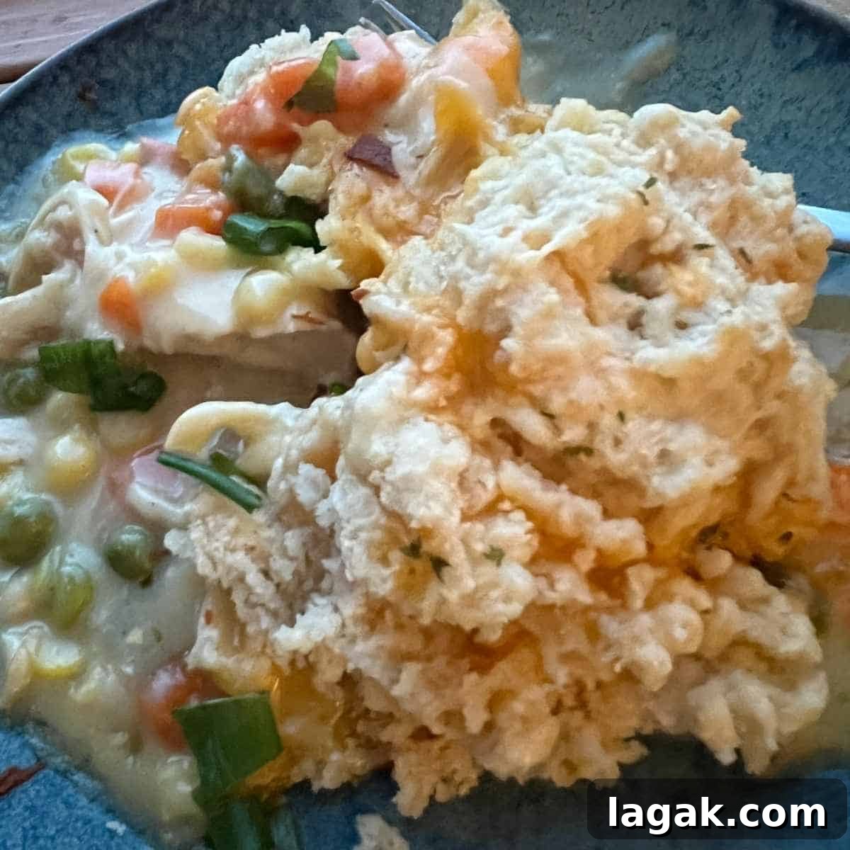 Cheddar Bay Biscuit Casserole Recipe: Cheesy Chicken Bake Tutorial 2 Chicken pot pie with Garlic Cheddar Bay Biscuits on a plate.