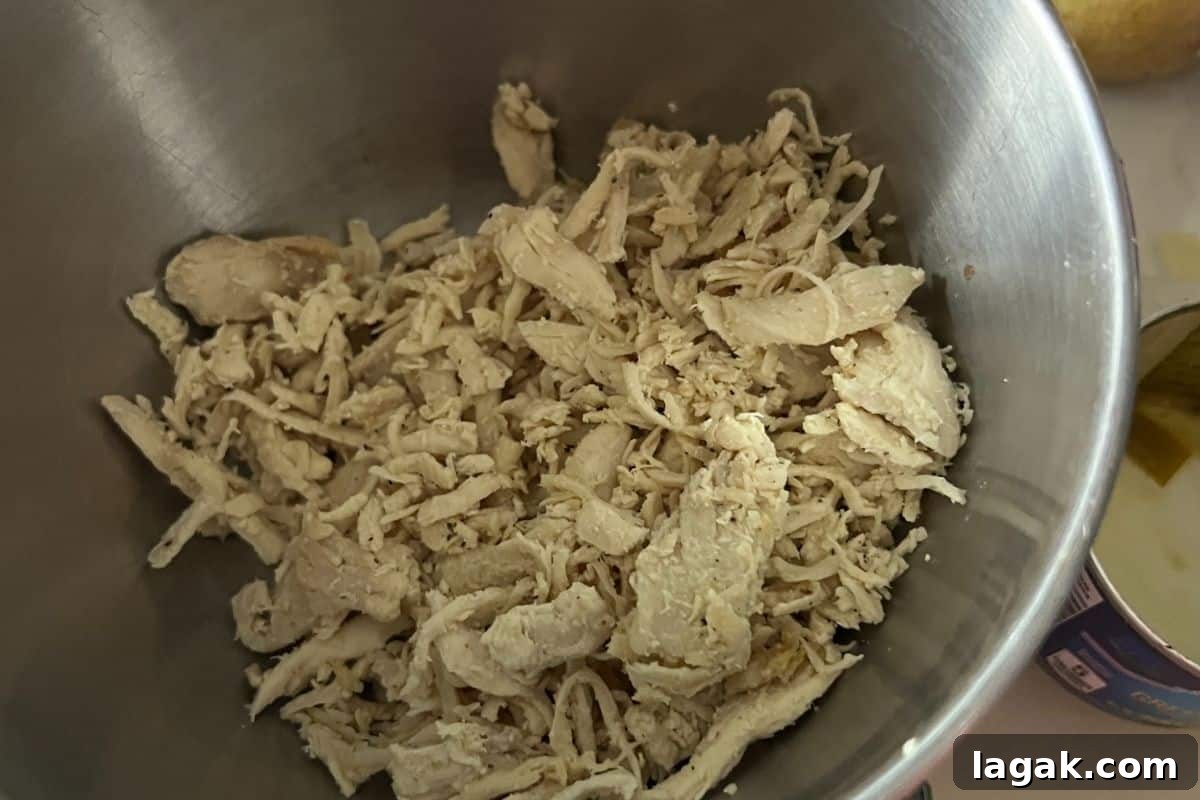 Cheddar Bay Biscuit Casserole Recipe: Cheesy Chicken Bake Tutorial 4 Shredded cooked chicken.