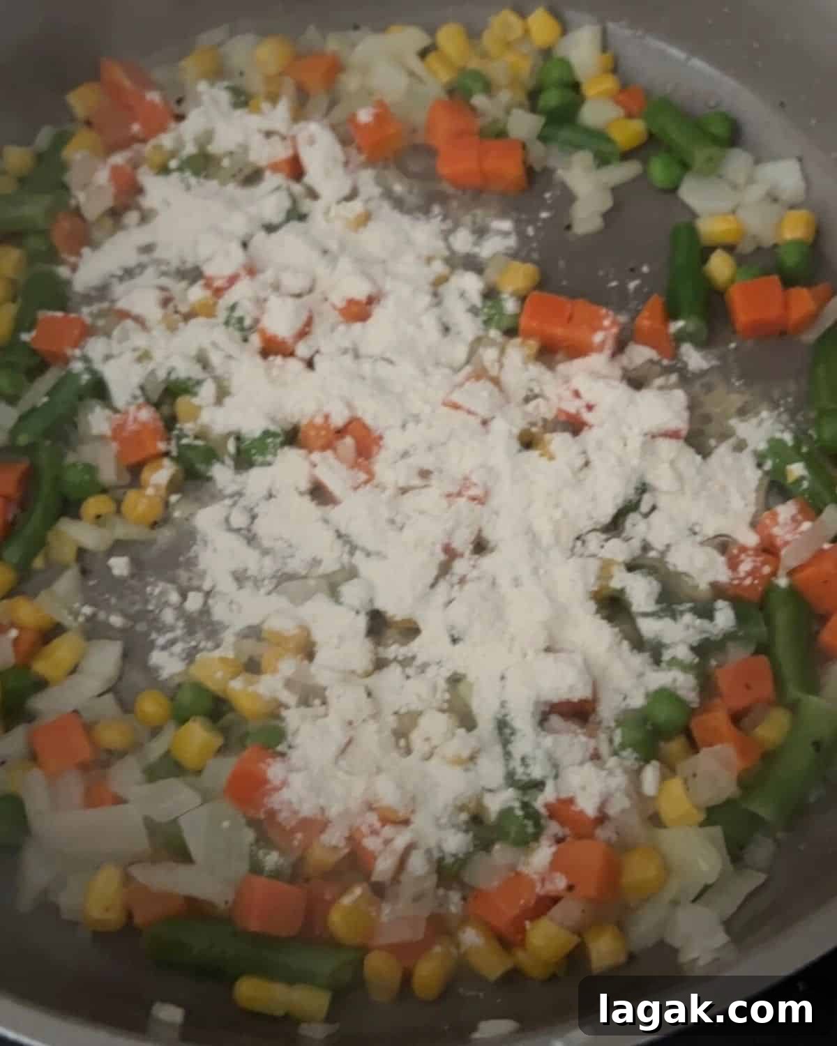 Cheddar Bay Biscuit Casserole Recipe: Cheesy Chicken Bake Tutorial 5 Vegetables cooking with flour to make a roux.