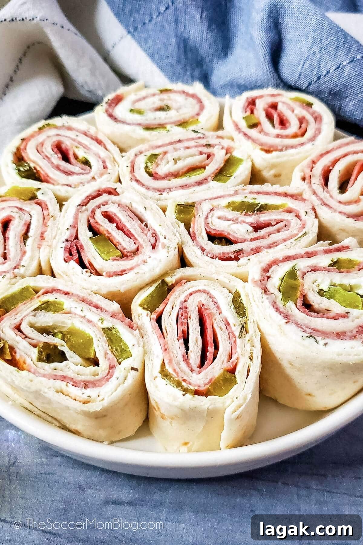 Dill Pickle Roll-Ups: Tangy Appetizer Recipe for Parties 6 dill pickle roll-ups on an appetizer plate