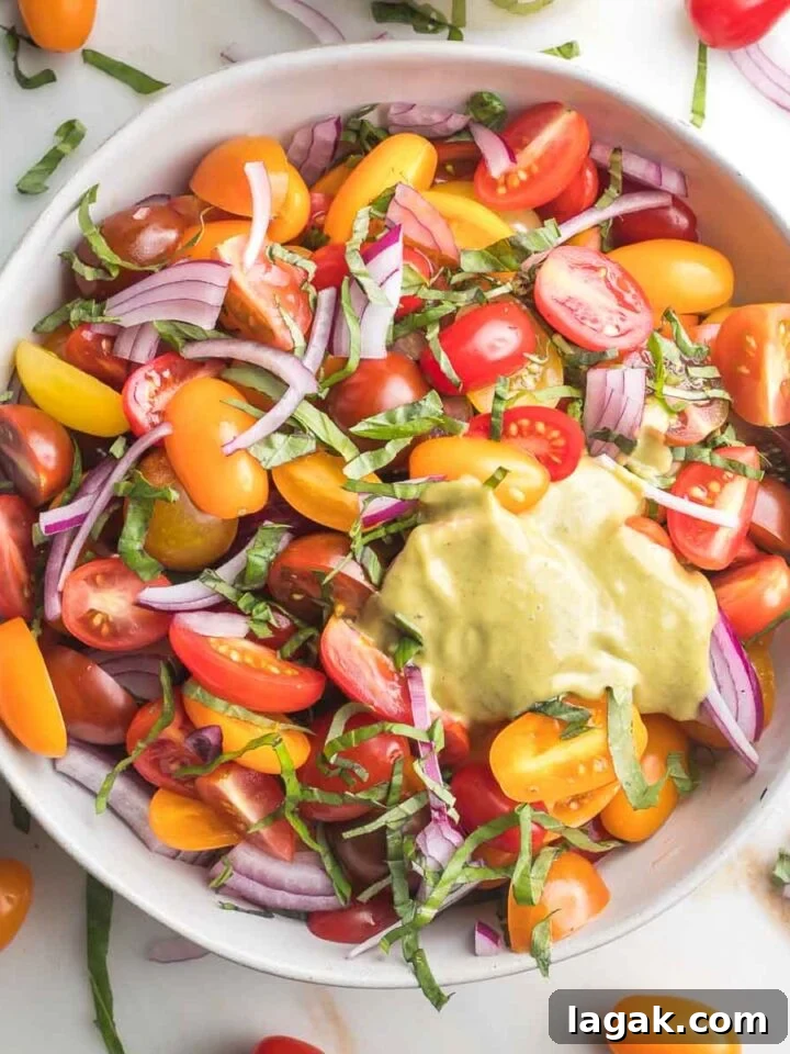 Chopped fresh tomatoes with red onion and fresh basil and a creamy balsamic vinaigrette.