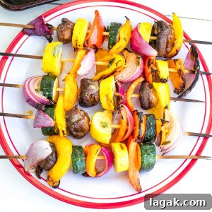Veggie kabobs filled with colorful vegetables.