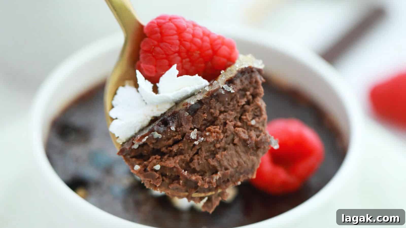29 Party-Worthy Treats That Won’t Leave Leftovers 4 Three cups of chocolate pudding with whipped cream and raspberries.