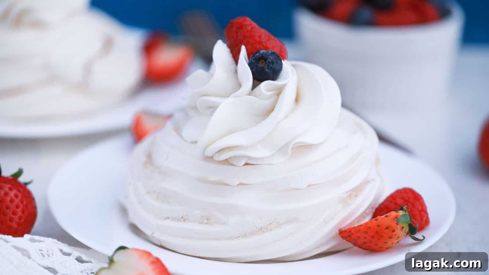 29 Party-Worthy Treats That Won’t Leave Leftovers 9 Mini pavlova nests with whipped cream and berries.