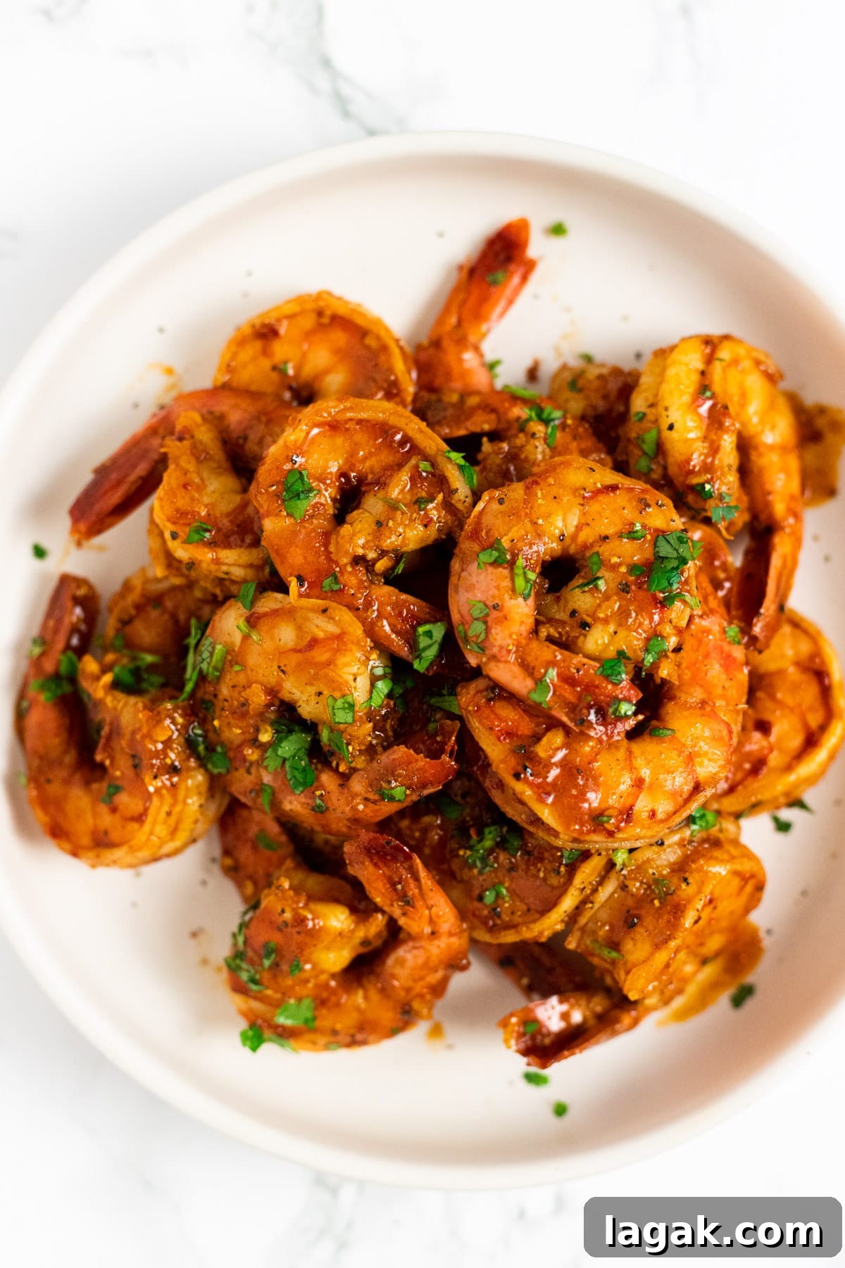 Zesty Chili-Lime Shrimp Skewers with Cilantro Lime Sauce 2 A top down view of a bowl of chili lime shrimp