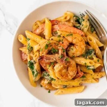 a top down view of a bowl of cajun shrimp pasta