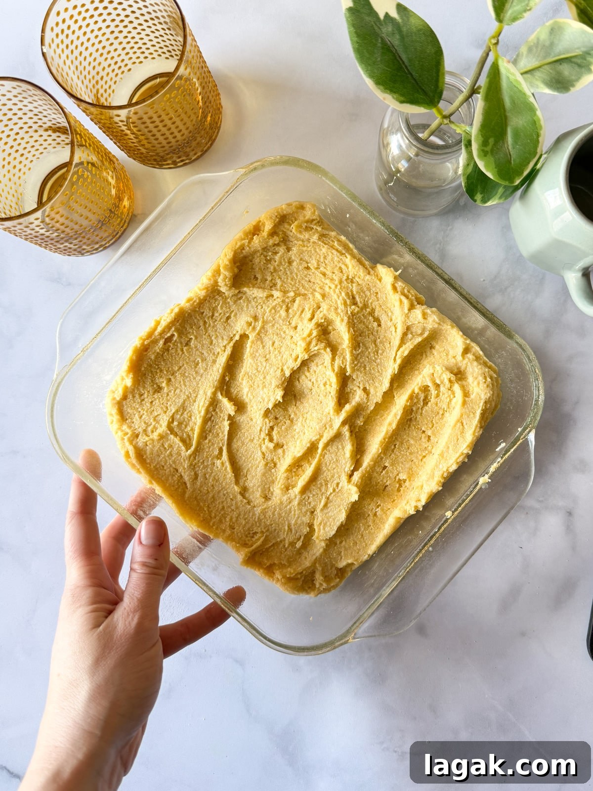 unbaked gluten-free cornbread in a baking dish 