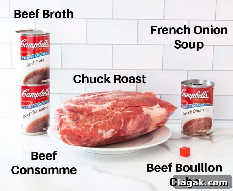 Crock-Pot French Dip Sandwich Recipe for Tender, Flavorful Beef 4 Raw chuck roast, can of French onion soup, beef consomme, beef broth, and beef bouillon cube on a counter.