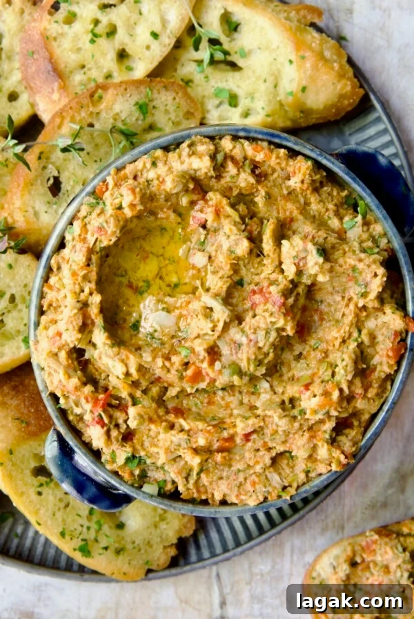 Artichoke Tapenade in blue bowl.