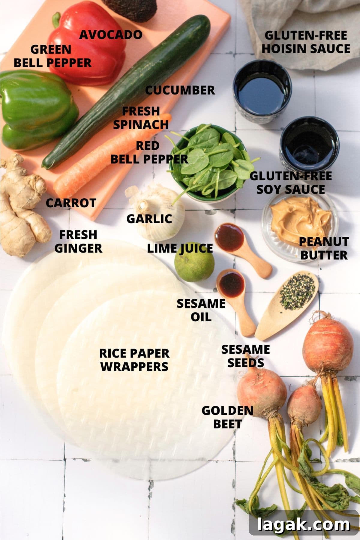 Ingredients for vegetarian summer rolls recipe laid out on board.