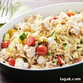 Black bowl of Greek Chicken Pasta Salad.