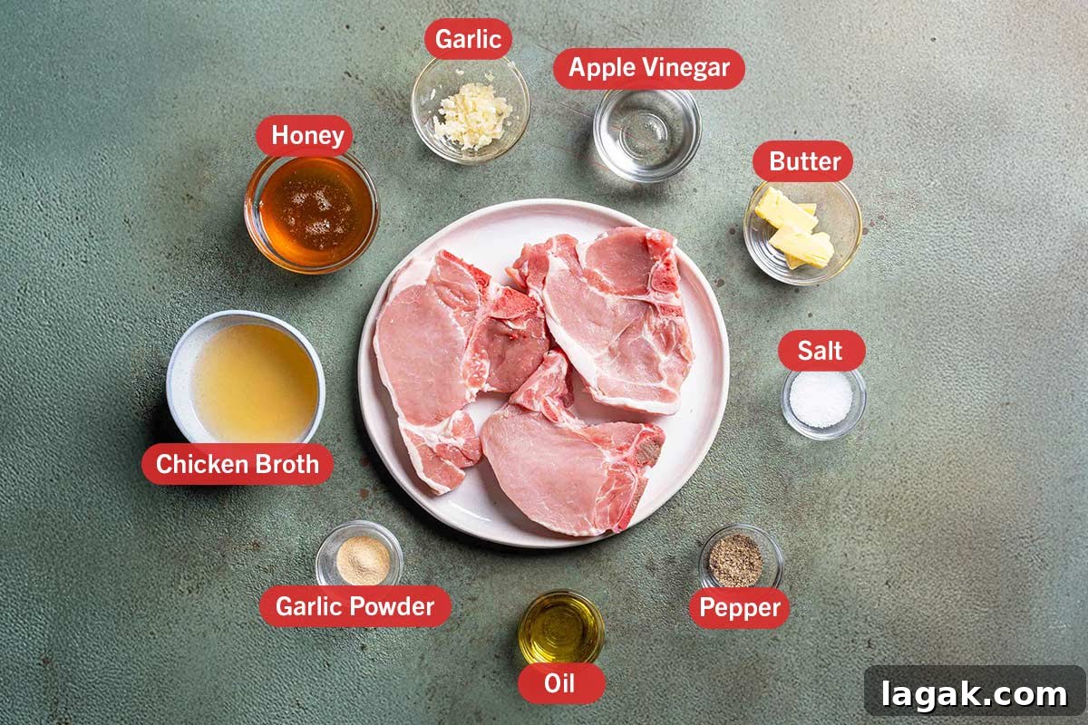 Honey Garlic Pork Chops with Sweet Glaze — Quick Weeknight Recipe 3 ingredients laid out on a green background in white bowls: honey, garlic, apple vinegar, butter, salt, pepper, oil, garlic powder, chicken broth and pork chops