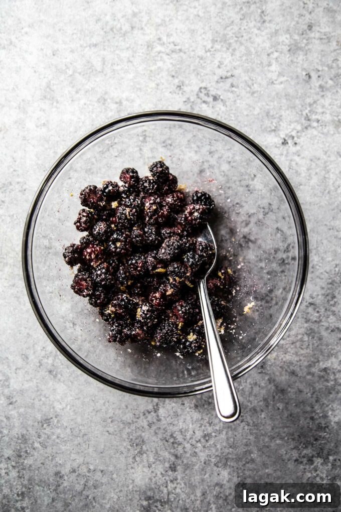 Cardamom Blackberry Brie Bites with Honey and Crispy Phyllo 4 blackberries in a bowl with sugar