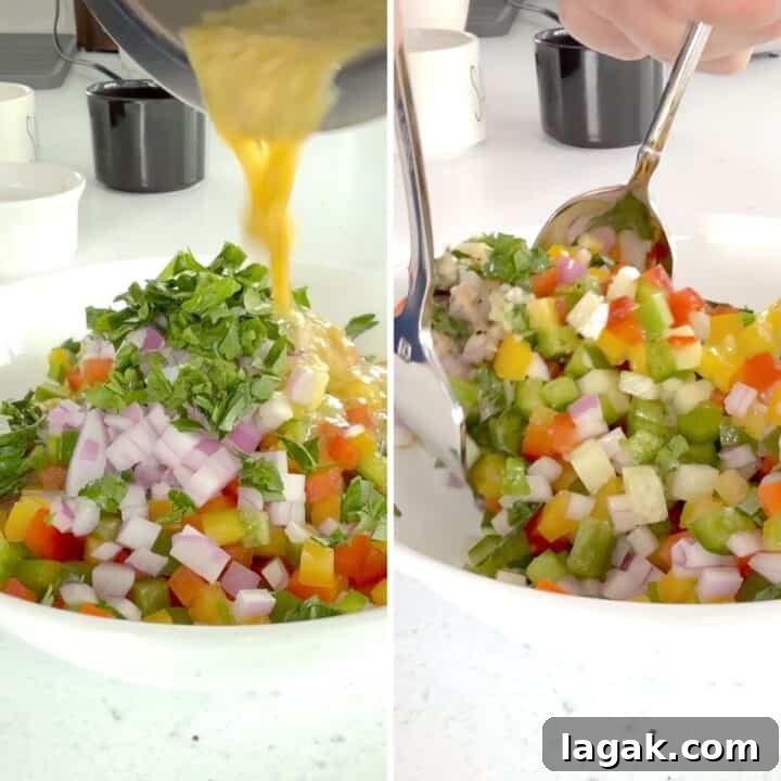 Mediterranean Cucumber and Bell Pepper Salad with Feta and Herbs 5 Pouring the dressing over the chopped cucumber and bell pepper salad.