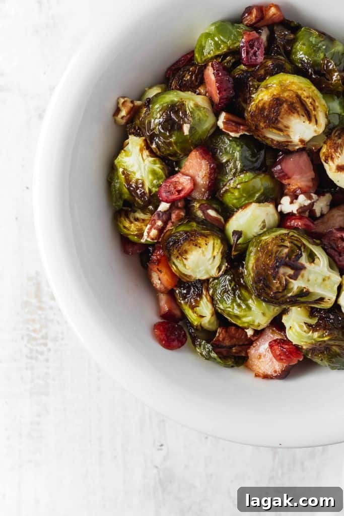 Brussels sprouts roasted with bacon, dried cranberries, and pecans