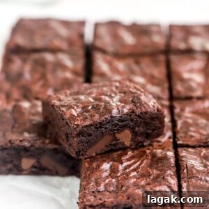 A brownie set on a batch of sliced brownies.