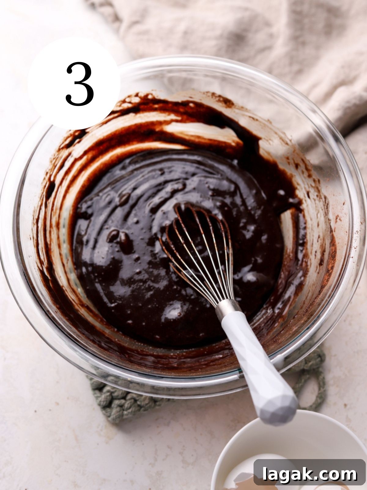 Irresistible Brown Butter Brownies Recipe for Rich, Nutty Flavor 6 A mixing bowl with brownie batter being whisked together.