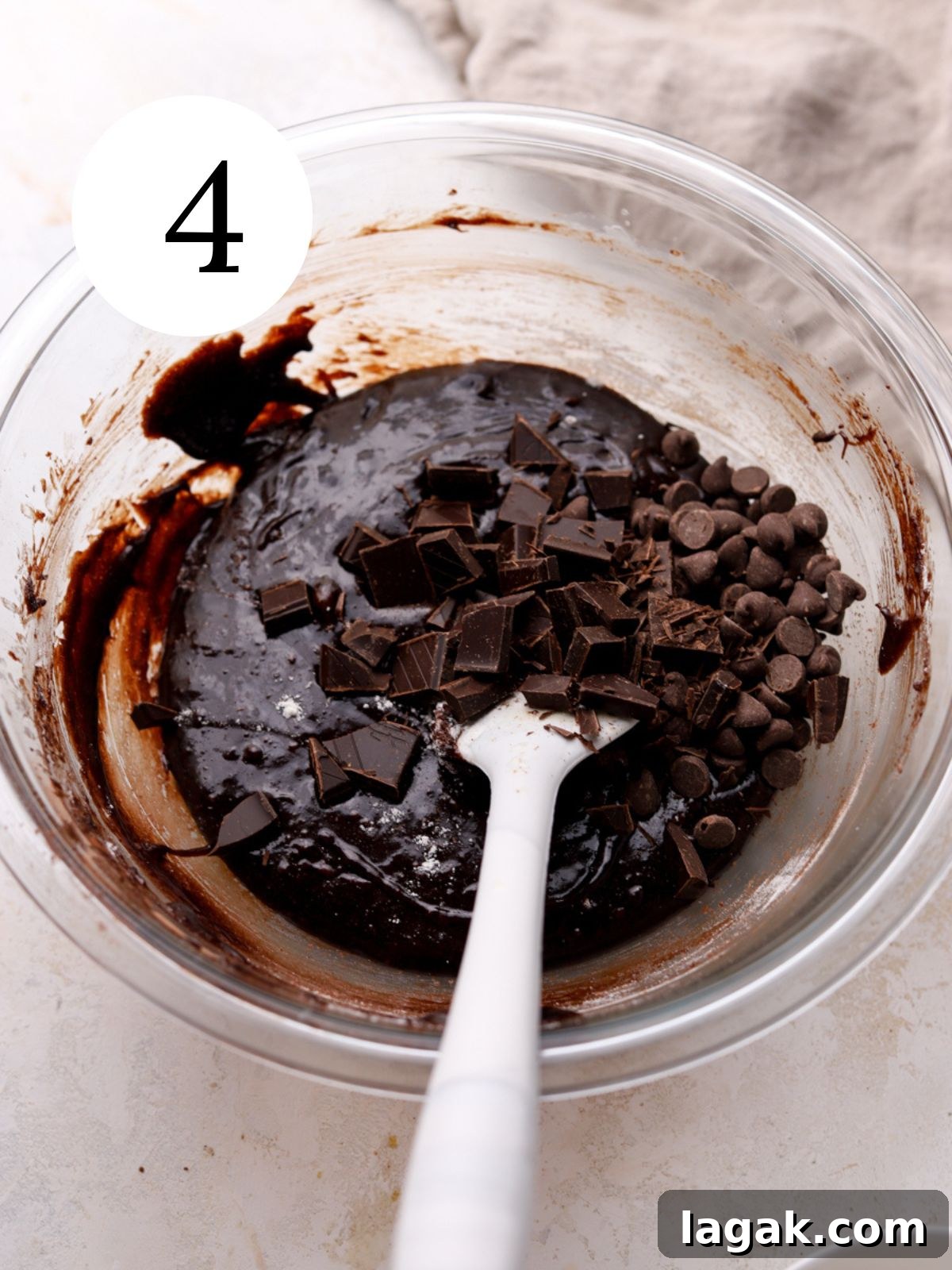 Irresistible Brown Butter Brownies Recipe for Rich, Nutty Flavor 7 Chocolate being stirred into brownie batter.