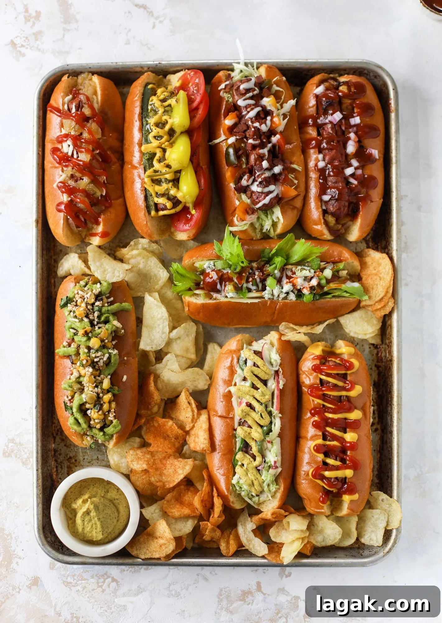 Throw a Hot Dog Bar This Weekend + 7 Gourmet Hot Dog Ideas 2 Nothing screams summer more than a hot dog bar! Grab your buns and dogs and a whole lot of toppings. This is super fun and delicious!