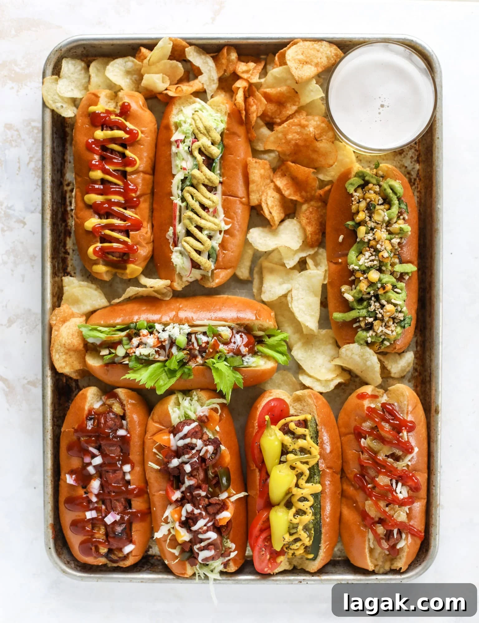 Throw a Hot Dog Bar This Weekend + 7 Gourmet Hot Dog Ideas 14 Nothing screams summer more than a hot dog bar! Grab your buns and dogs and a whole lot of toppings. This is super fun and delicious!